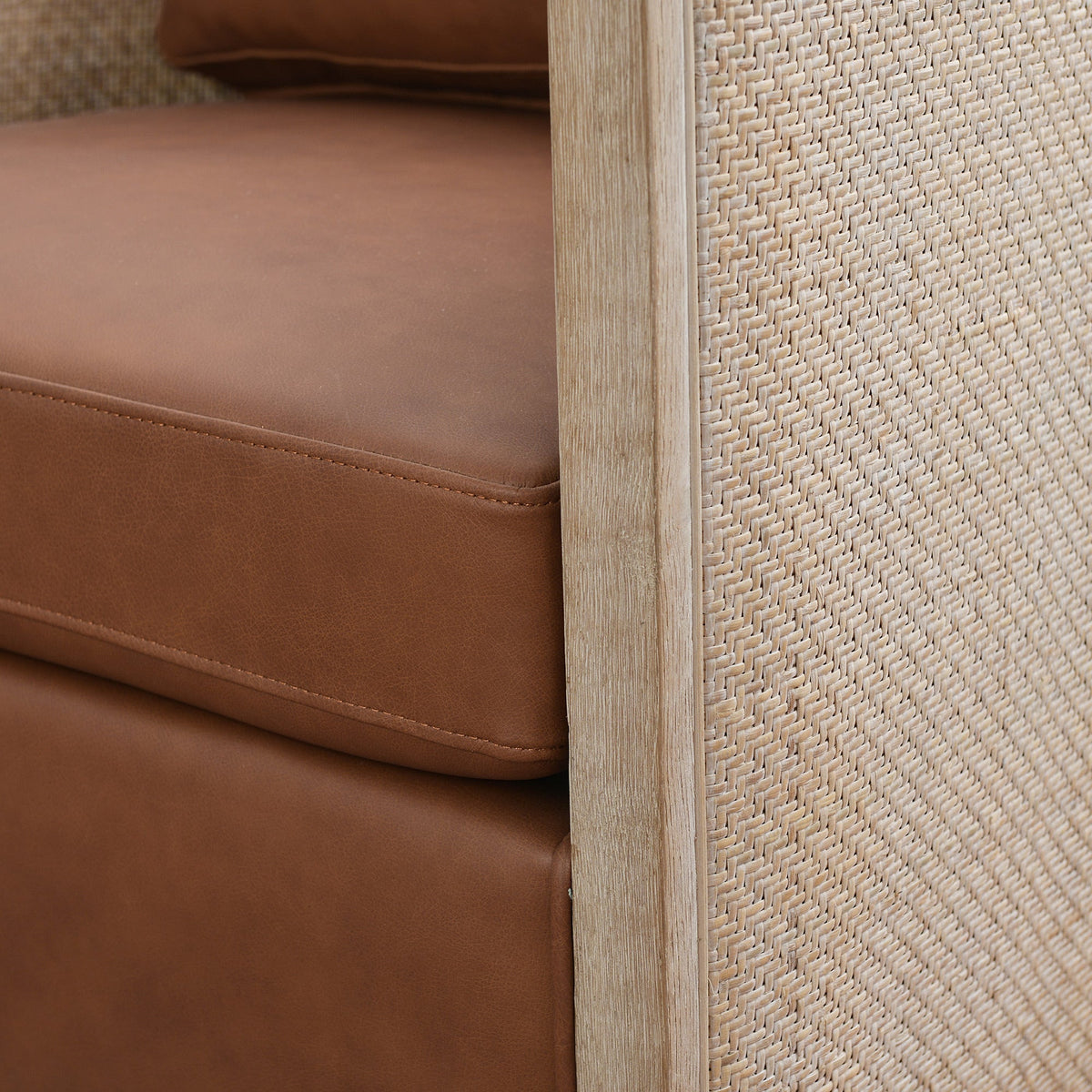 Claude Premium Leather Swivel Cane Chair