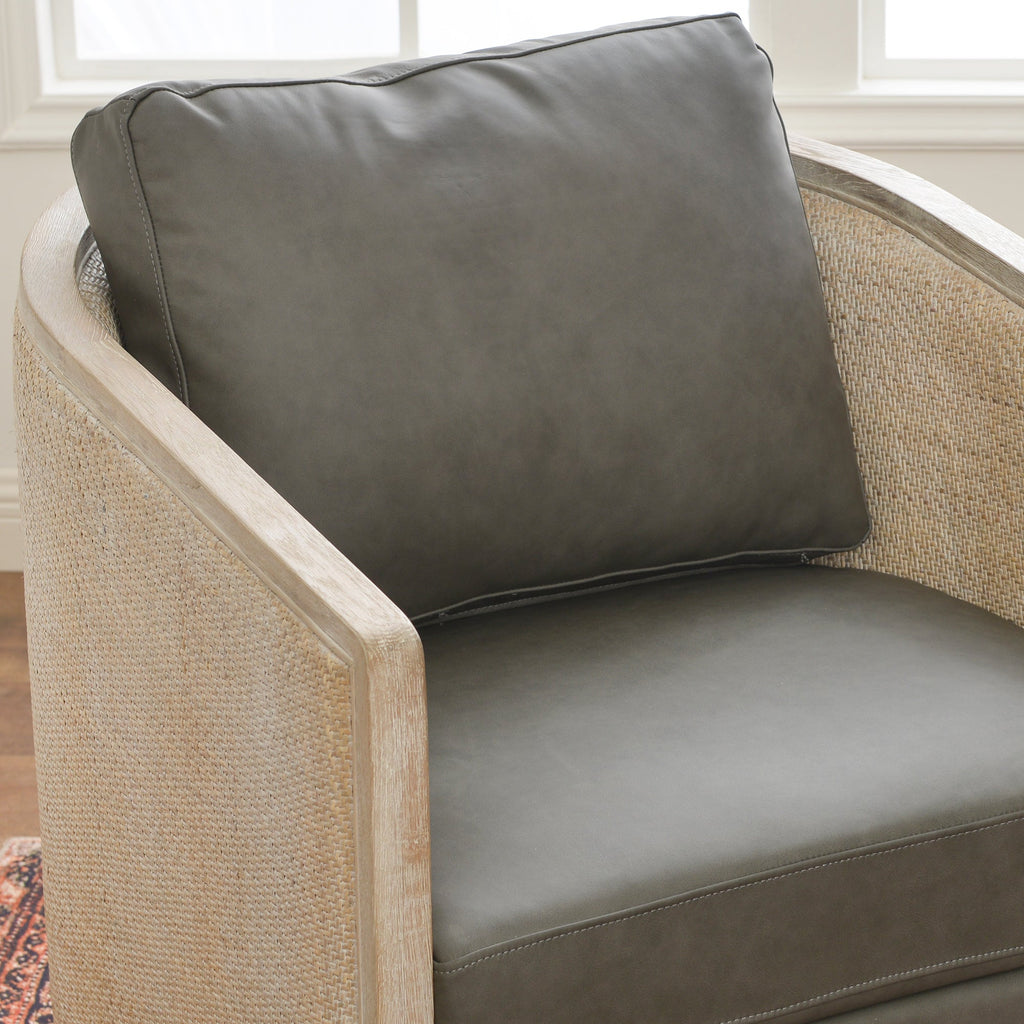 Claude Premium Leather Swivel Cane Chair