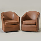 Lawton Faux Leather Tufted Swivel Barrel Chair