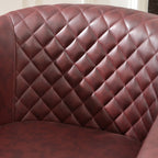 Logan Faux Leather Tufted Swivel Club Chair