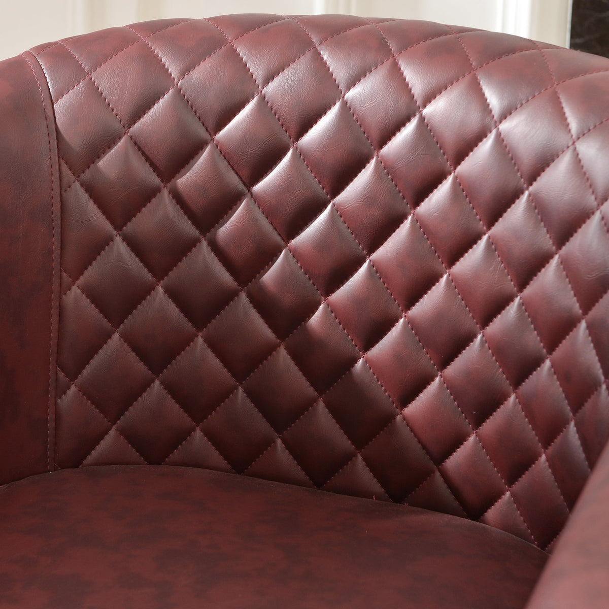 Logan Faux Leather Tufted Swivel Club Chair