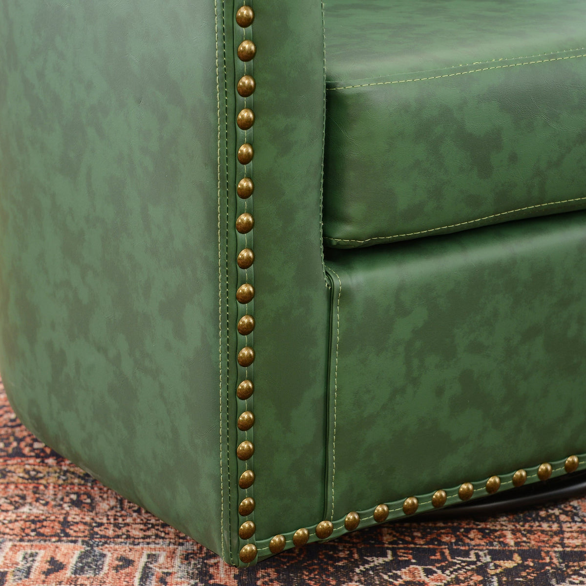 Logan Faux Leather Tufted Swivel Club Chair