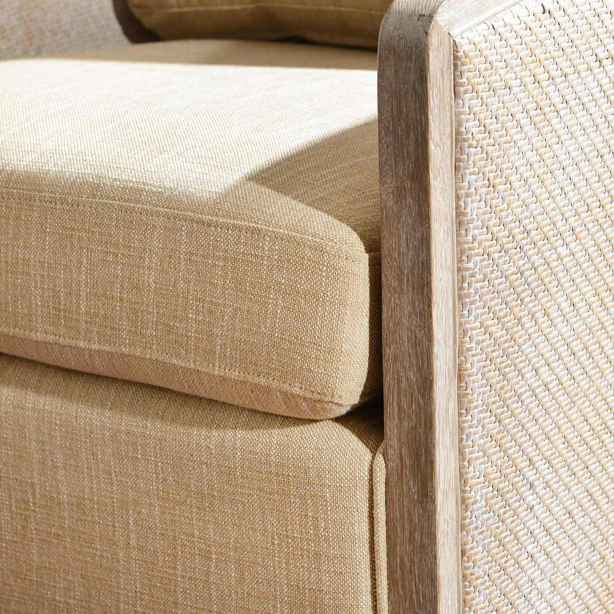 Claude Linen Swivel Cane Chair