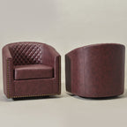 Logan Faux Leather Tufted Swivel Club Chair