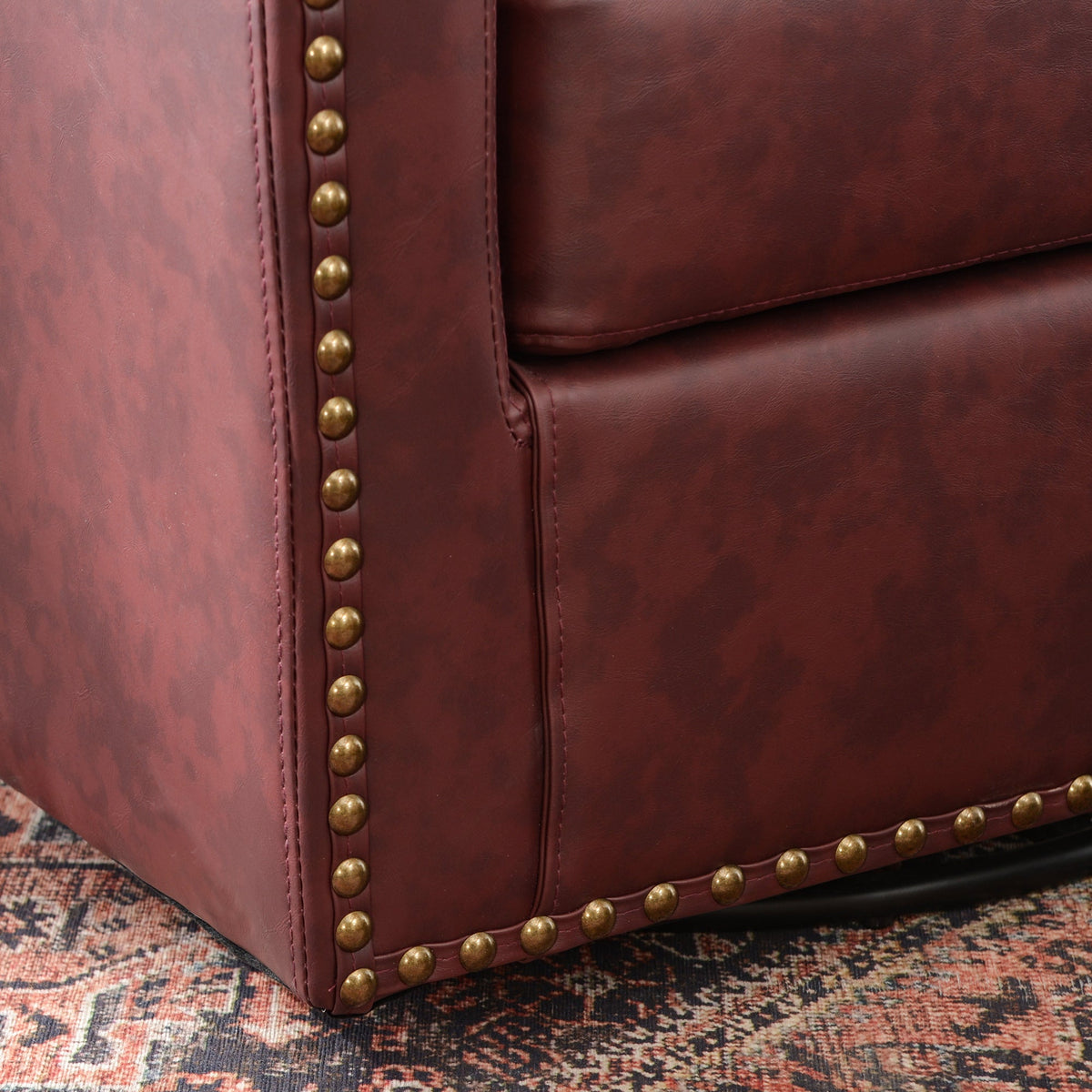 Logan Faux Leather Tufted Swivel Club Chair