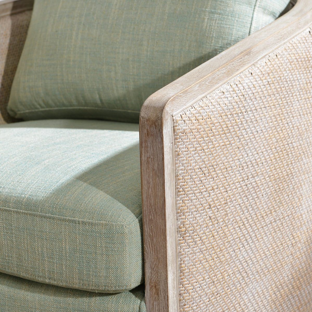Claude Linen Swivel Cane Chair
