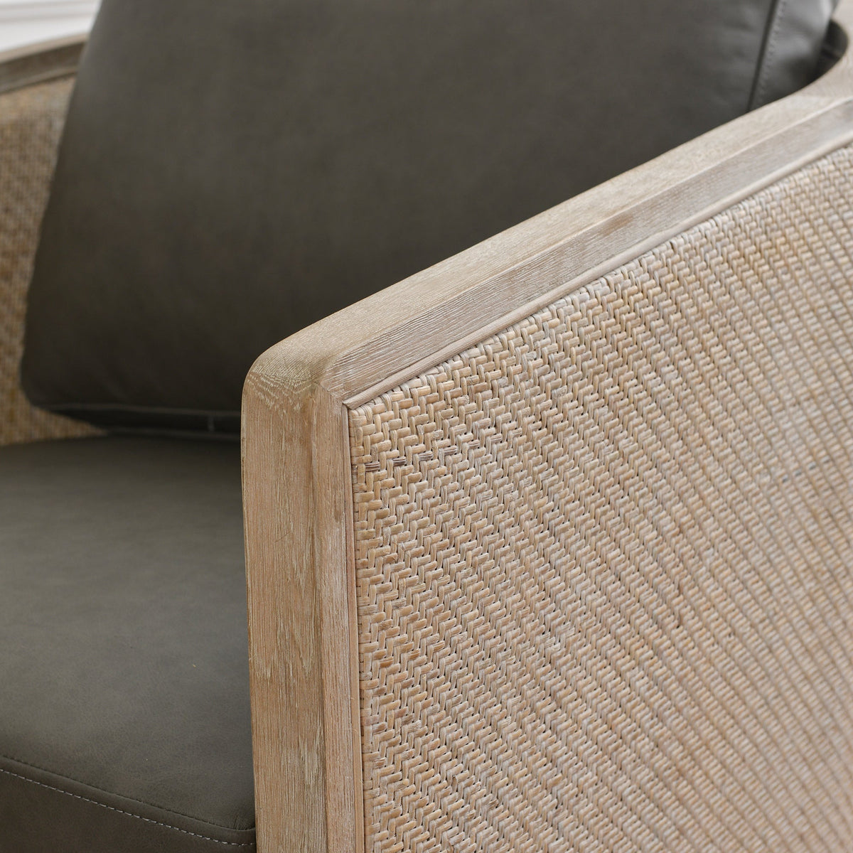 Claude Premium Leather Swivel Cane Chair