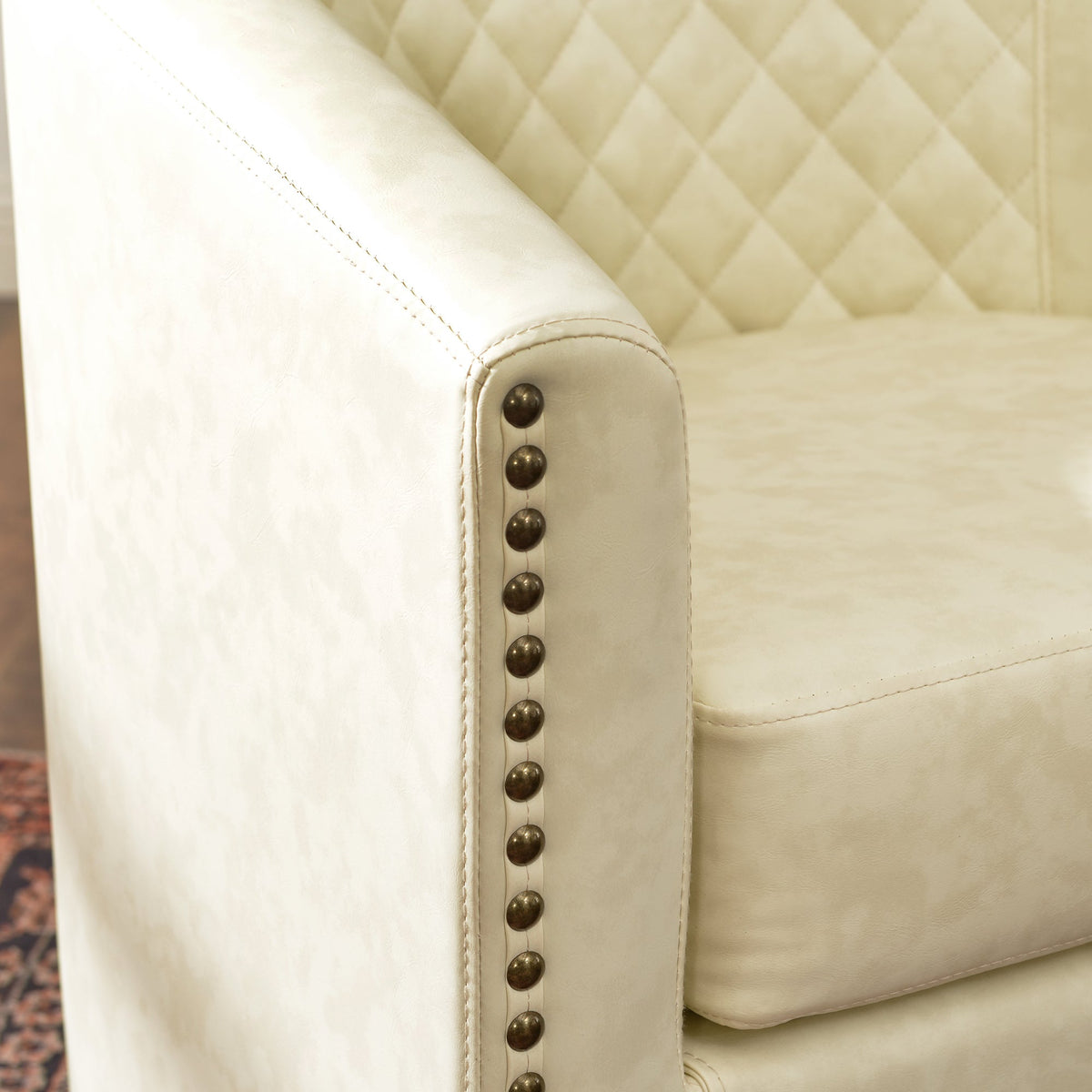Logan Faux Leather Tufted Swivel Club Chair