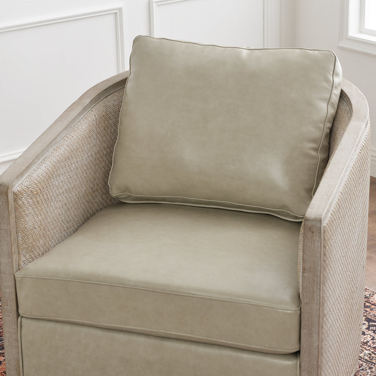 Claude Premium Leather Swivel Cane Chair