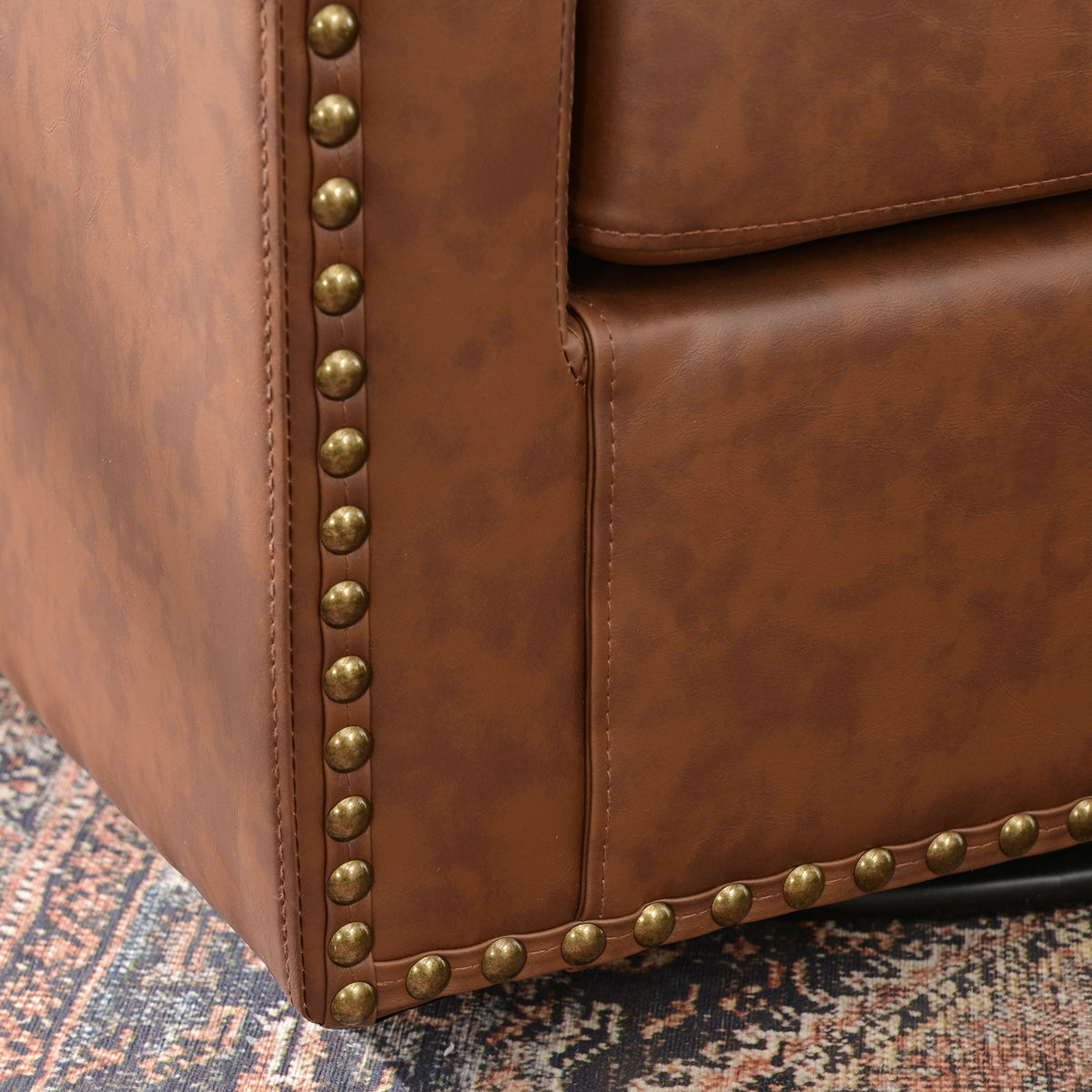 Logan Faux Leather Tufted Swivel Club Chair