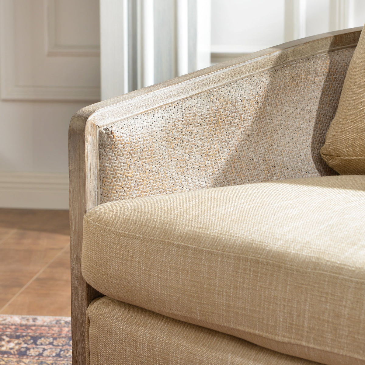 Claude Linen Swivel Cane Chair