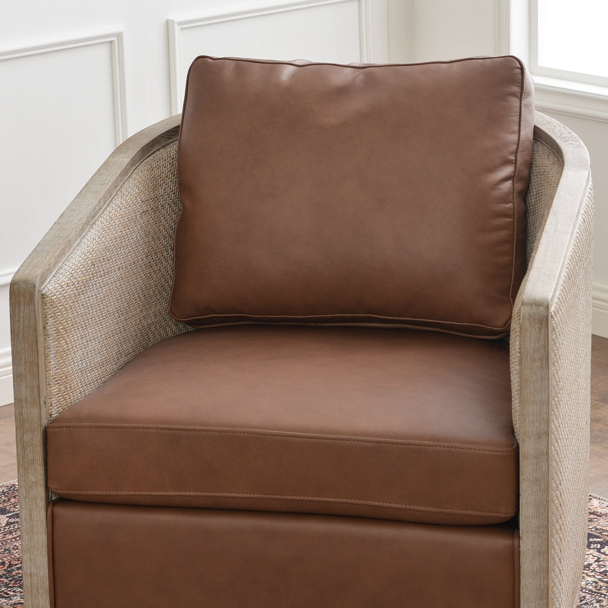 Claude Premium Leather Swivel Cane Chair