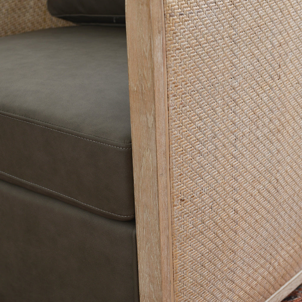Claude Premium Leather Swivel Cane Chair