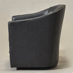 Lawton Faux Leather Tufted Swivel Barrel Chair
