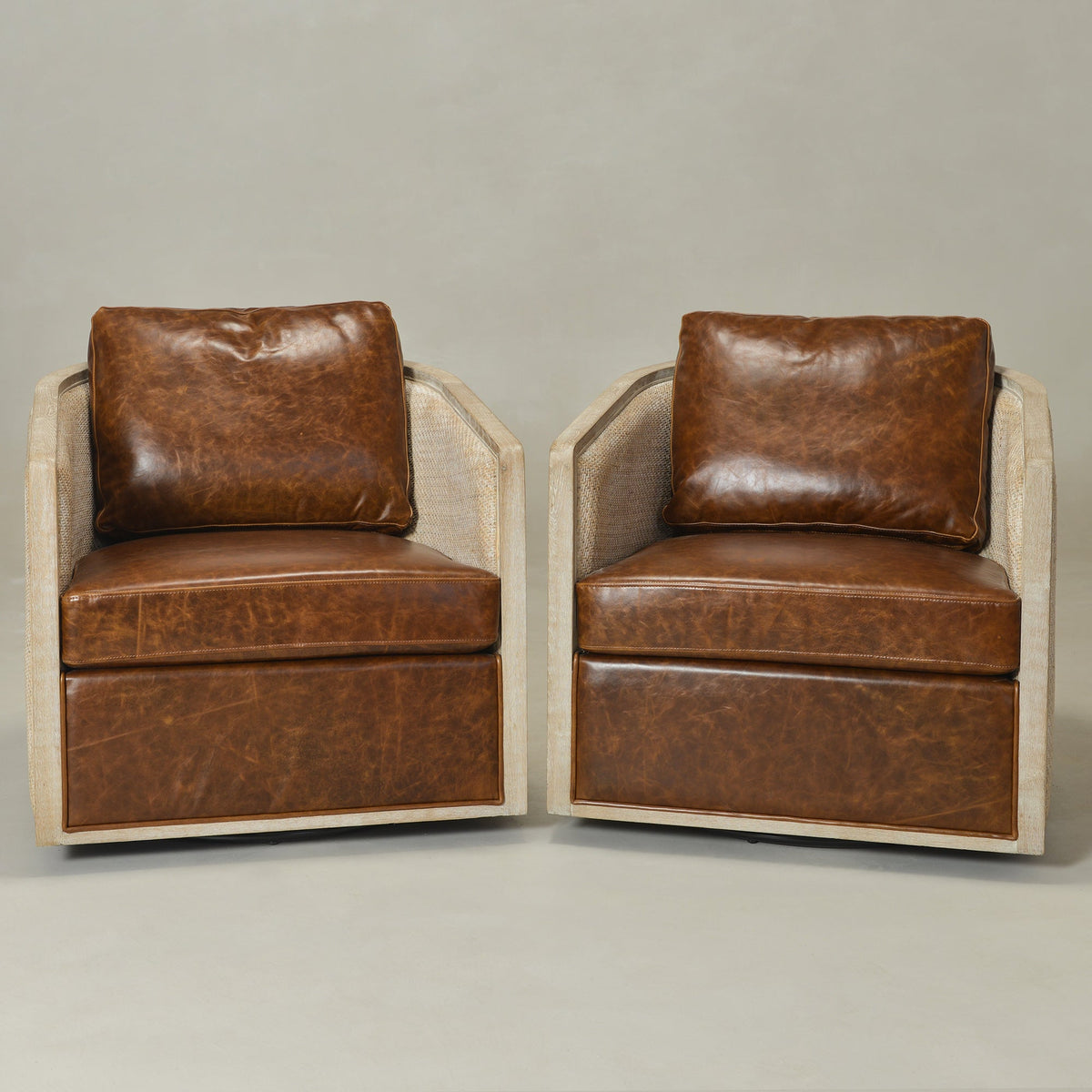 Claude Premium Leather Swivel Cane Chair