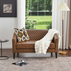 Logan Faux Leather Tufted Loveseat