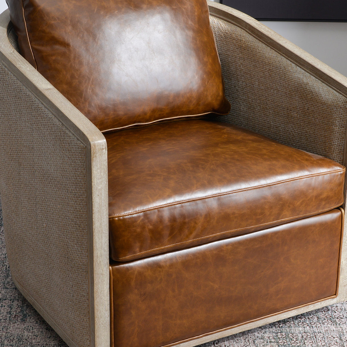 Claude Premium Leather Swivel Cane Chair
