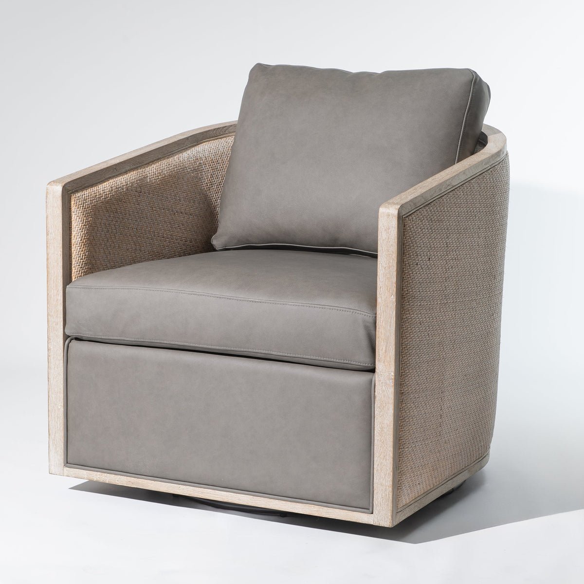 Claude Premium Leather Swivel Cane Chair