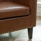 Logan Faux Leather Tufted Club Chair