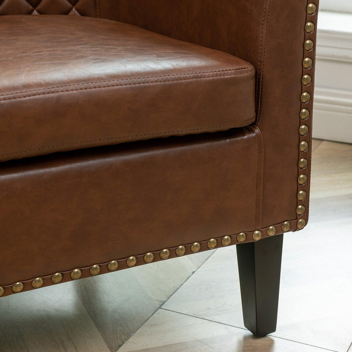 Logan Faux Leather Tufted Club Chair