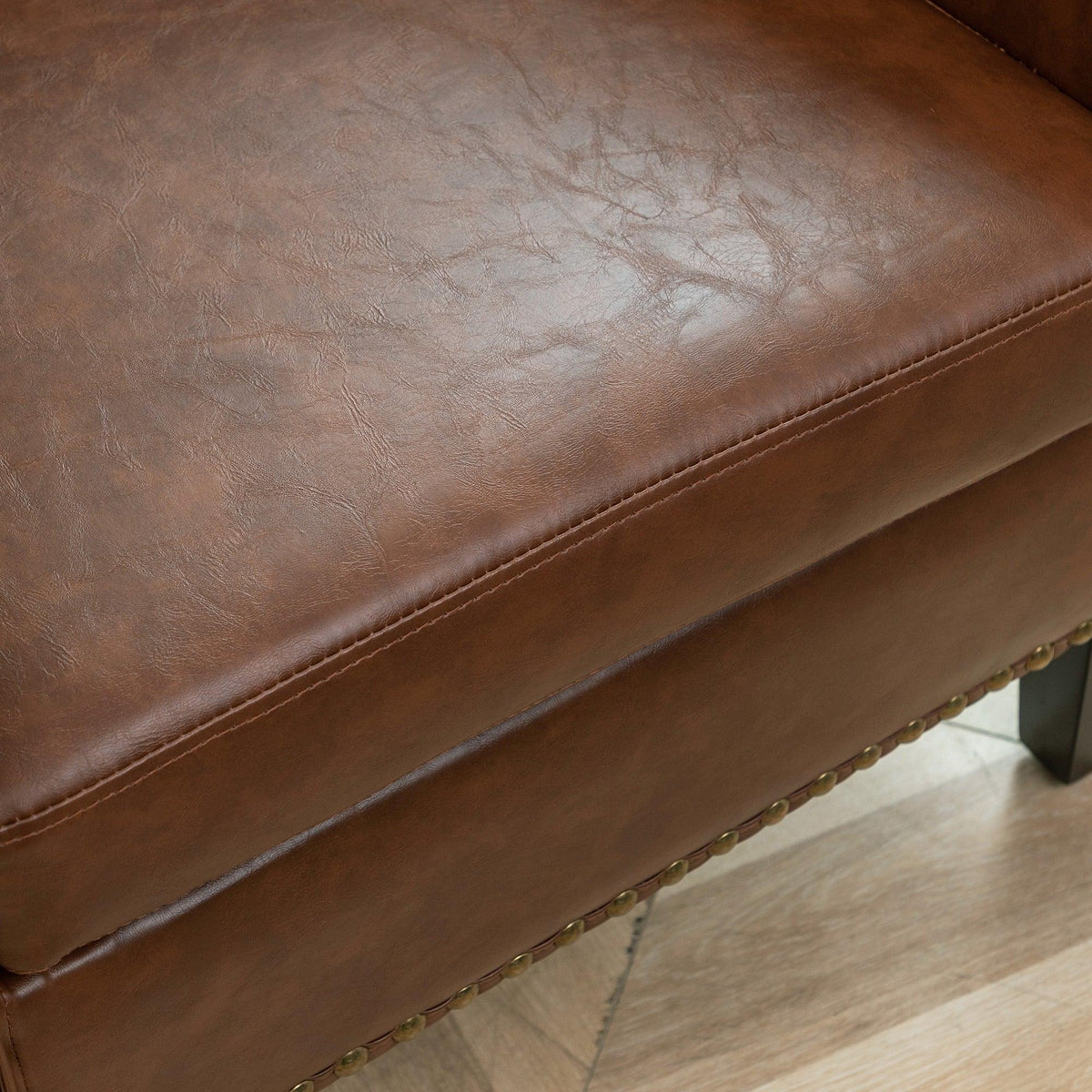 Logan Faux Leather Tufted Club Chair